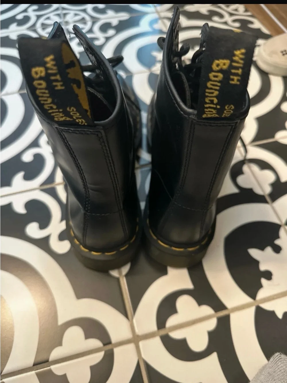 Dr. Martens Black Leather Lace-Up Combat Boots with Yellow Stitching
